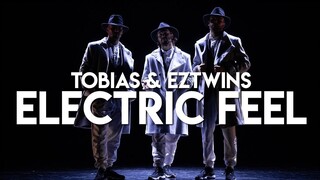 Anh chàng nhảy múa trong chiếc áo khoác trench coat thật đẹp trai! Cặp song sinh EZtwins đã hợp tác 