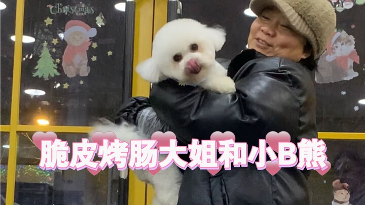 The “Crispy Grilled Sausage Sister” comes to the pet shop to pick up her dog and ends up doing invol