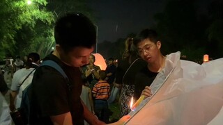 Everyone is busy making water lanterns. The sky lanterns are a little watery and the video editing i