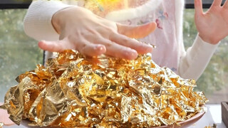 Tôi đã dùng Jinshan để làm một mặt dây chuyền vàng bùn, di sản văn hóa phi vật thể. Đây mới chính là
