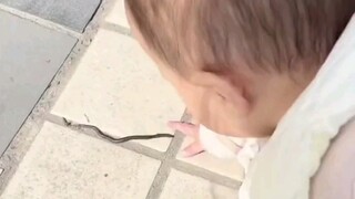 The child's hands were so quick that we were caught off guard.