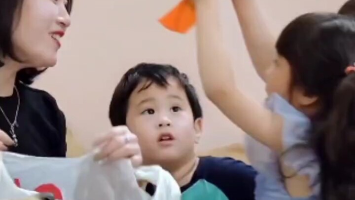 [Mario] Thinking his mom doesn’t like his gift, little chubby hands fumble in confusion.