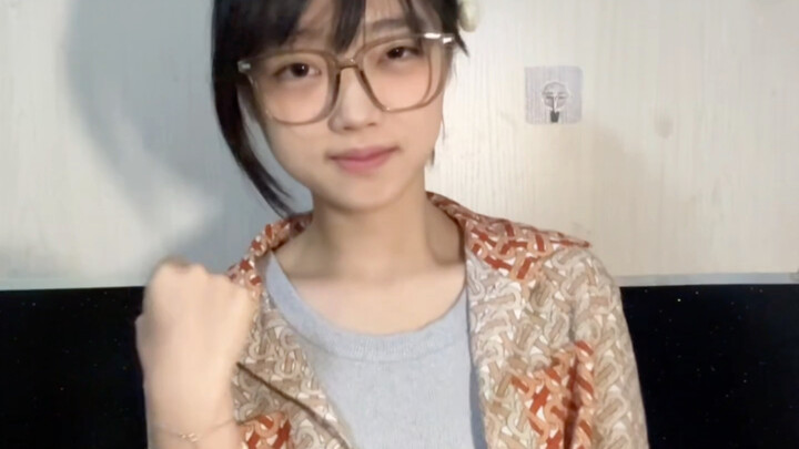 Dancing to Douyin music with a displeased look