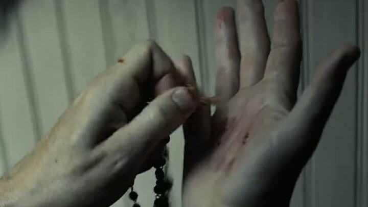 The priest accidentally discovers that his hand sizzles and smokes when exposed to sunlight.