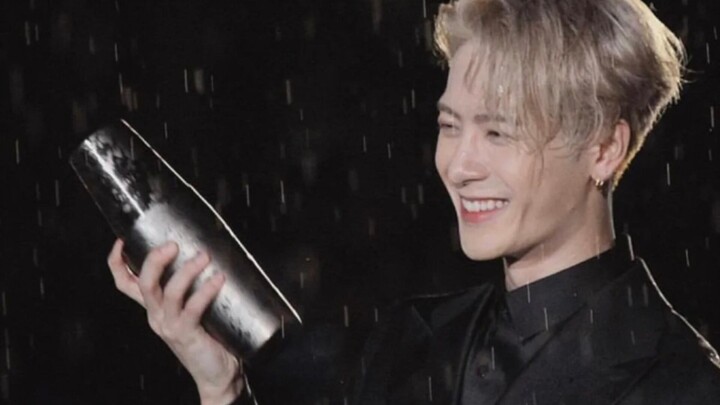 This man is just shaking his coffee in the rain.