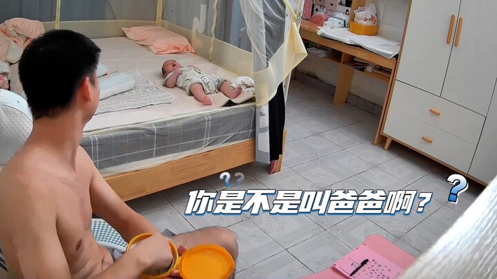 A three-month-old baby, “hungry,” finally babbled “Dada” for the first time—just look how thrilled h