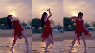 The red dress on the beach is suitable for dancing to a non-alcoholic song at sunset - TWICE's "Alco