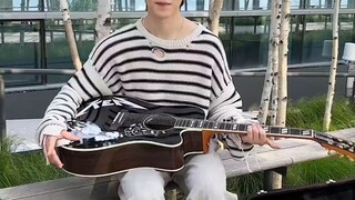 Jimin received the guitar Ken (Barbie)