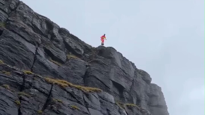 Extreme Pogo: Cliff Jumps Into an Impossible Backflip