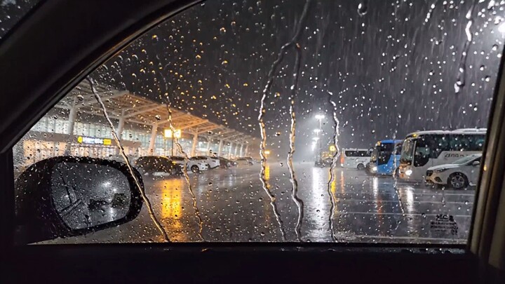 Heavy Rainy Night from Inside a Car — Rain Streaks, Golden Lights & Glistening Reflections