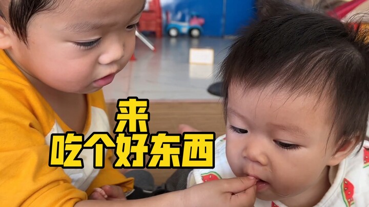 Big brother and dad team up, yet they still can’t outwit their 9-month-old sister.