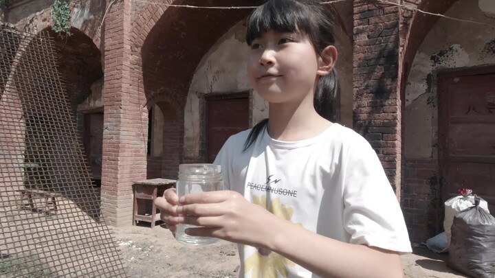 The child just wanted to pour you a glass of water!