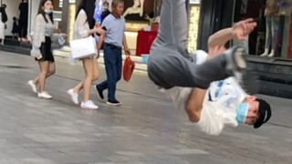 The street show started and the passers-by were shocked