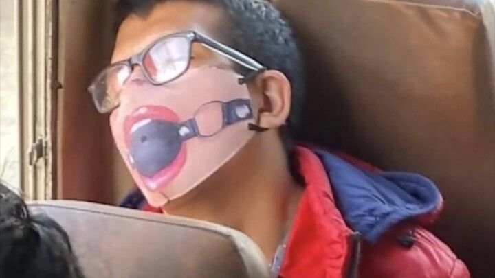 Wearing a very new kind of mask.