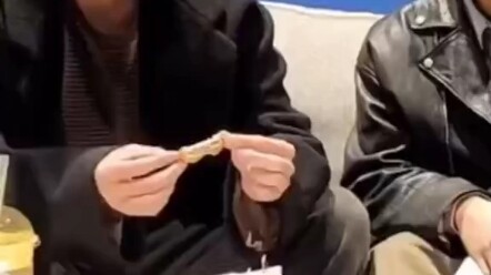 Namjoon shouts the slogan, and the youngest member, Line, looks flustered and overwhelmed.