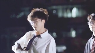 Two boys danced a duet of "Trouble Maker" on the playground late at night