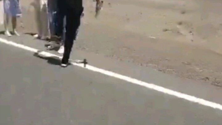 Taking photos while speeding in and out of a vehicle led to being chased and beaten by other drivers