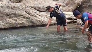 cast netting in Nepal | himalayan trout fishing with handmade cast net |