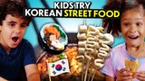 Kids Try Korean Street Food For The First Time! (Tteokbokki, Kimbap, Hotteok, Bungeo-ppang)