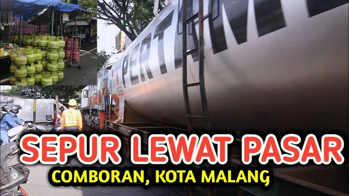 KERETA API LEWAT PERMUKIMAN DAN PASAR COMBORAN KOTA MALANG