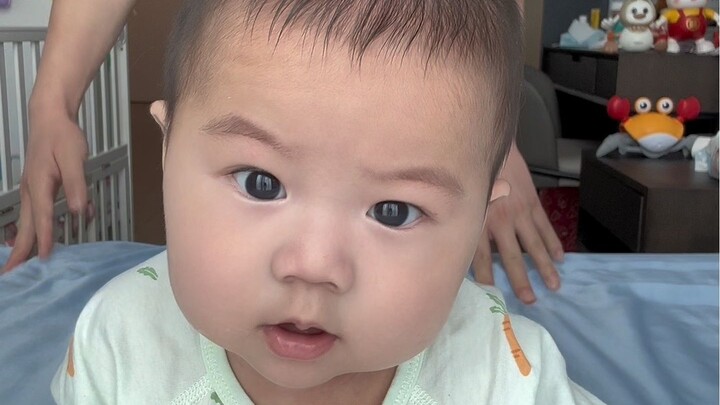 Watch the baby for me while I do the dishes. The baby is four months and nine days old!
