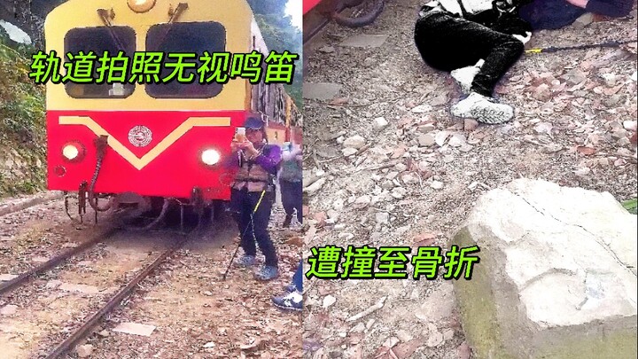 55-year-old female tourist takes photos with her back to the train, ignores the train’s horn and is 