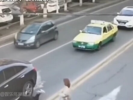 Real-life Cosplay of a Speed Bump at an Intersection