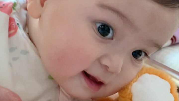 Who can resist a baby’s adorable tilted-head charm?