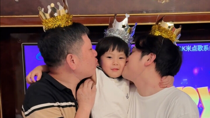 The three of them are blowing out candles together again!