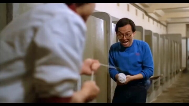 Two mischievous guys are messing with others in the bathroom.