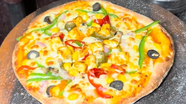 300-rupee Indian-style pizza—the chef’s skills are really good.