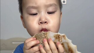 Human cubs immerse themselves in eating