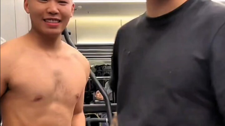 Coke shows off his impressive physique—his body really is quite good.