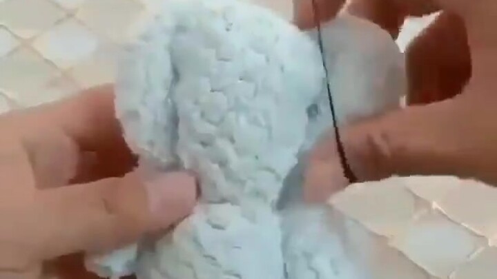 Folding Dolls with a Towel