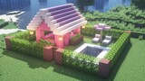 Pink beautiful house with a pool in minecraft