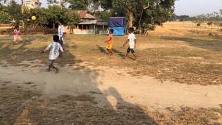 Village child playing football ball in the field  ⚽️