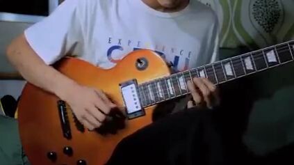 Orang Main Gitar