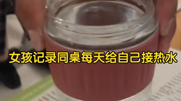 A girl documents her deskmate bringing her hot water every day.