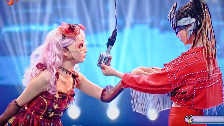 Li Zixuan and Zhou Jieqiong, the masked dancers, battle online in the Candy Cannon vs. Iron Girl