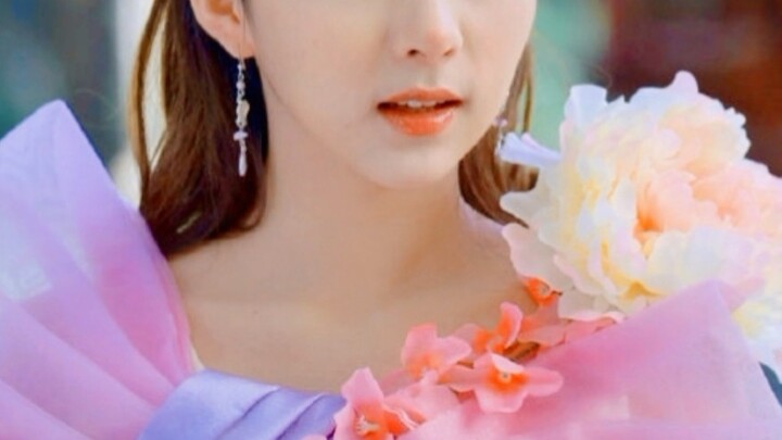 This is the most stunning flower fairy I’ve ever seen! With so many flowers adorning her, she looks 