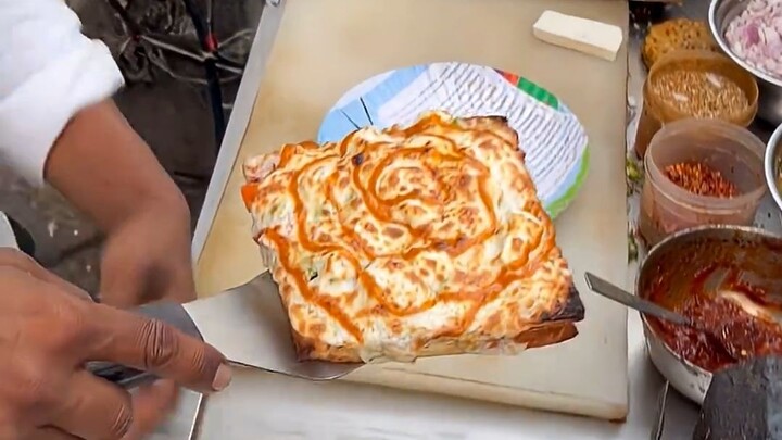 130-rupee sandwich and pizza—so generously loaded with ingredients!