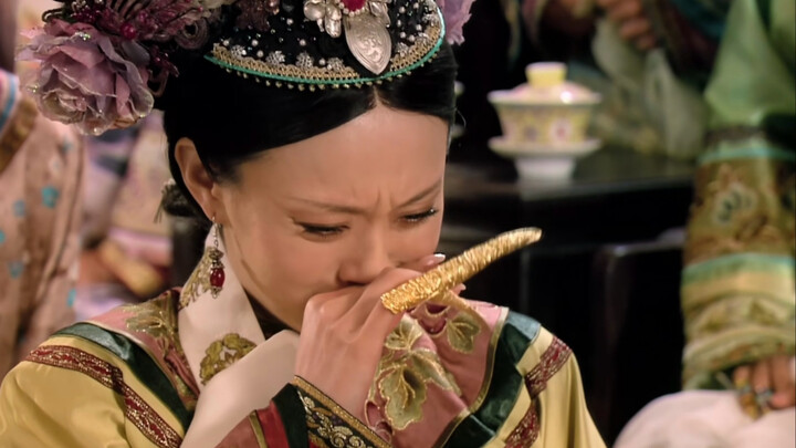 Eyes are shedding tears while the corners of the mouth smirk—such a natural performer!