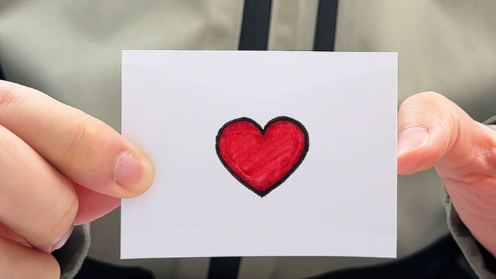 Make a super simple paper heart, a fun magic trick, romance will never go out of style