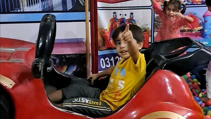 Hadi enjoying at play land