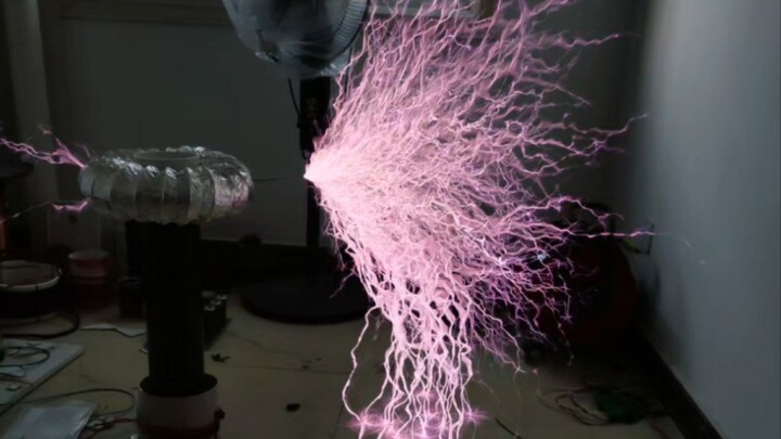 800,000-volt Tesla coil discharging continuously.