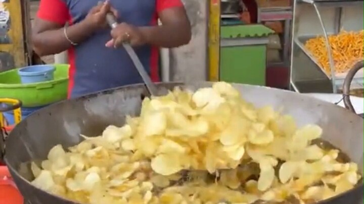 Freshly fried potato chips