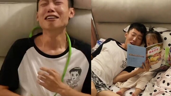 Dad tries to lull the baby to sleep but gets scared witless by a toy snake, then clings to Mom, whin