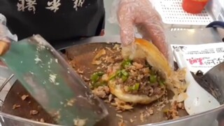 Go to the night market and buy a roujiamo from Grandpa, it comes with tons of meat!