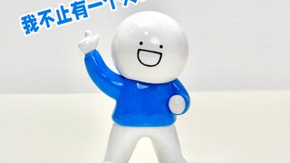 Saya menggunakan tanah liat untuk membuat Si Biru menjadi matryoshka Rusia.