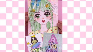 打扮三个娃娃
